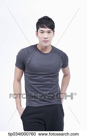 A man in sport wear View Large Photo Image Stock Image - A man in sport wear. Fotosearch
