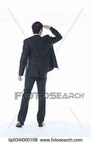 Stock Photo - A man looking over somewhere. Fotosearch