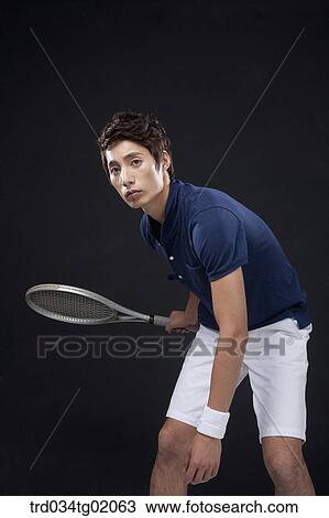A man playing tennis View Large Photo Image Stock Image - A man playing tennis. Fotosearch