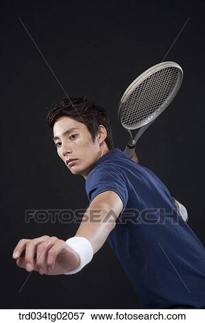 A man playing tennis View Large Photo Image Stock Photo - A man playing tennis. Fotosearch