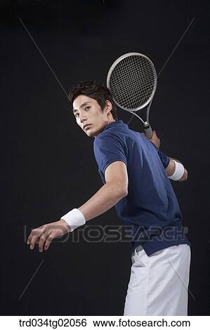 A man playing tennis View Large Photo Image Stock Photograph - A man playing tennis. Fotosearch