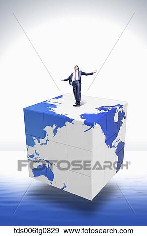 A man standing on the earch block with his arms open View Large Photo Image Stock Photo - A man standing on the earch block with his arms open. Fotosearch