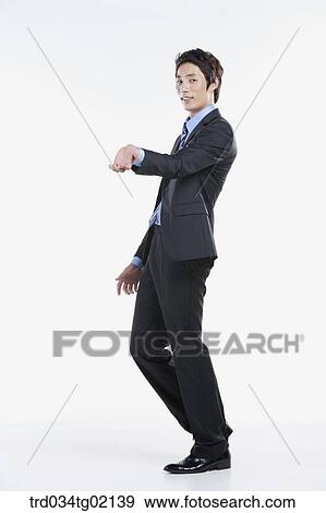A man supporting something View Large Photo Image Stock Photo - A man supporting something. Fotosearch