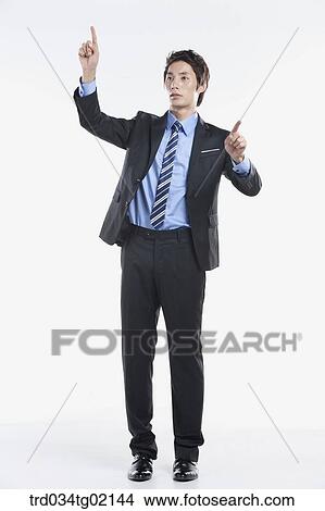 A man touching something with his finger View Large Photo Image Picture - A man touching something with his finger. Fotosearch