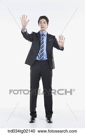 A man touching something with his finger View Large Photo Image Stock Image - A man touching something with his finger. Fotosearch