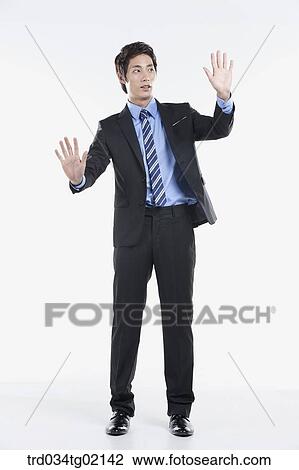 A man touching something with his finger View Large Photo Image Stock Image - A man touching something with his finger. Fotosearch