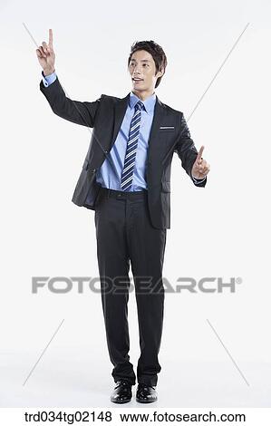 A man touching something with his finger View Large Photo Image Stock Photo - A man touching something with his finger. Fotosearch