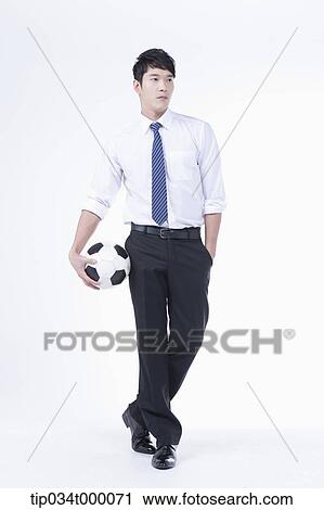 A man with a soccer ball View Large Photo Image Stock Image - A man with a soccer ball. Fotosearch