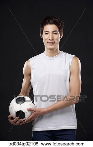 A man with a soccer ball View Large Photo Image Stock Photography - A man with a soccer ball. Fotosearch