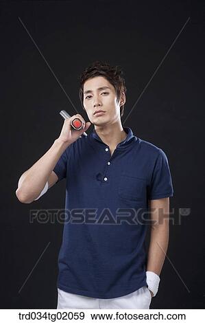 A man with a tennis racket View Large Photo Image Stock Photo - A man with a tennis racket. Fotosearch