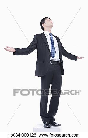 A man with his arms open View Large Photo Image Stock Photograph - A man with his arms open . Fotosearch