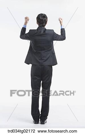 A man with his fist up View Large Photo Image Stock Image - A man with his fist up . Fotosearch