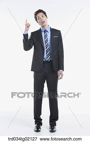 Stock Photo - A man with pointing finger. Fotosearch