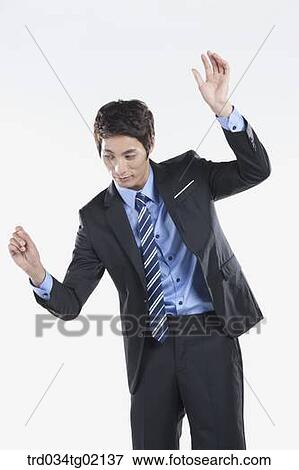 Stock Photo - A man writing something . Fotosearch