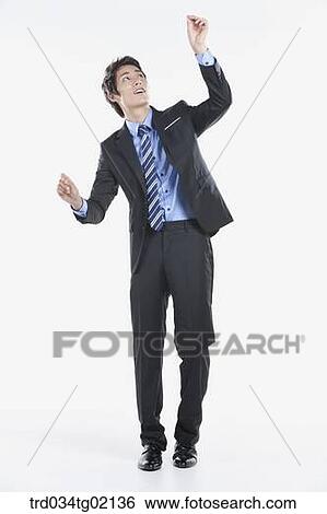 Stock Photograph - A man writing something . Fotosearch