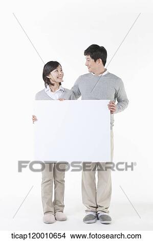 A mother and daughter looking at each other View Large Photo Image Picture - A mother and daughter looking at each other. Fotosearch