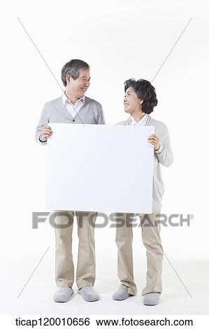 A mother and daughter looking at each other View Large Photo Image Stock Photograph - A mother and daughter looking at each other. Fotosearch