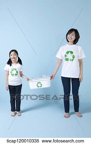 A mother and daughter with recycling bin View Large Photo Image Stock Photography - A mother and daughter with recycling bin . Fotosearch