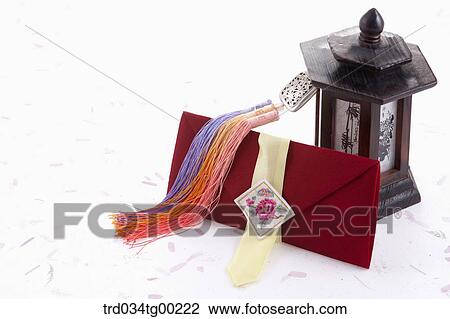A red traditional envelope, clothes accessory, and lamp View Large Photo Image Stock Image - A red traditional envelope, clothes accessory, and lamp . Fotosearch