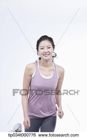 Stock Photograph - A running woman. Fotosearch
