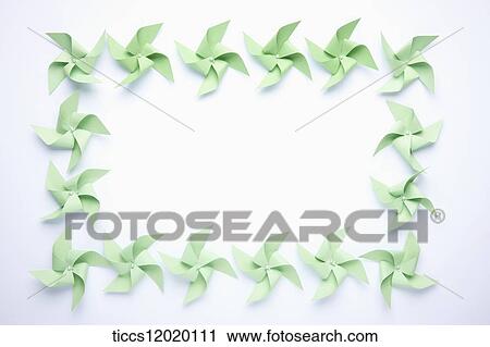 A sheet of paper with green pinwheel frame View Large Photo Image Stock Image - A sheet of paper with green pinwheel frame. Fotosearch