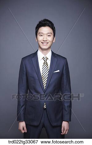 A smiling businessman View Large Photo Image Stock Photo - A smiling businessman. Fotosearch