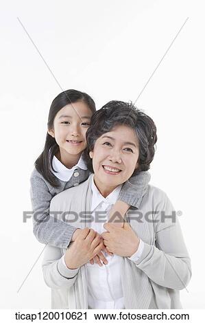 A smiling family View Large Photo Image Stock Image - A smiling family . Fotosearch