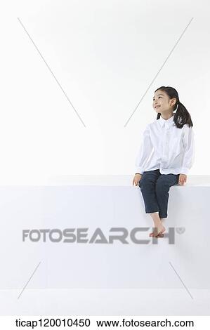 Stock Image - A smiling girl . Fotosearch