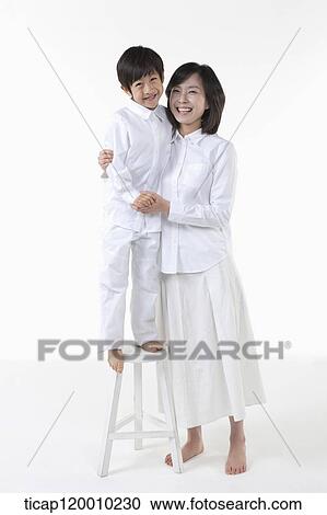 A smiling mother and son View Large Photo Image Stock Image - A smiling mother and son . Fotosearch