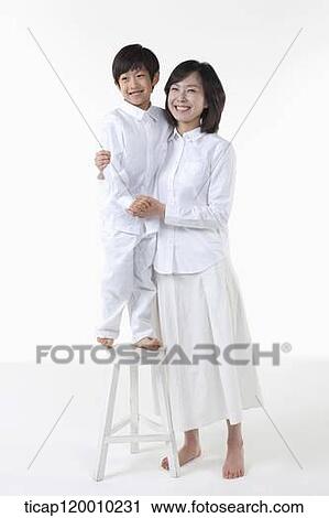 A smiling mother and son View Large Photo Image Stock Image - A smiling mother and son . Fotosearch