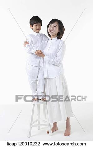 A smiling mother and son View Large Photo Image Stock Image - A smiling mother and son . Fotosearch