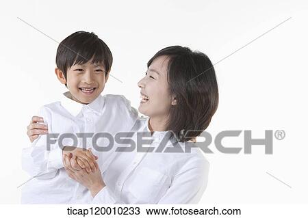 Stock Image - A smiling mother and son . Fotosearch