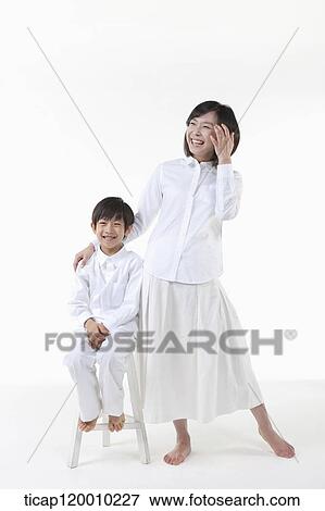 A smiling mother and son View Large Photo Image Stock Photo - A smiling mother and son . Fotosearch