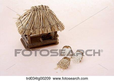 A straw house with small strainers View Large Photo Image Stock Photo - A straw house with small strainers. Fotosearch