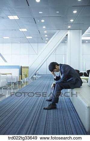 A stressful businessman on the couch View Large Photo Image Stock Photo - A stressful businessman on the couch. Fotosearch