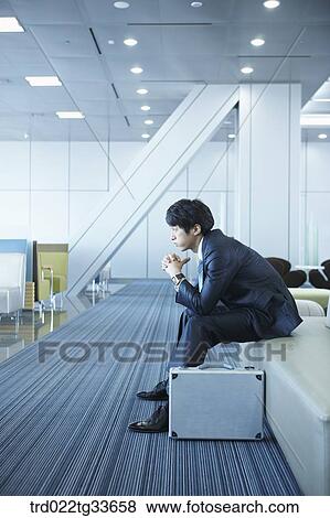 A stressful businessman with a briefcase View Large Photo Image Stock Photo - A stressful businessman with a briefcase. Fotosearch