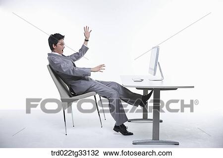A surprised businessman in front of the monitor View Large Photo Image Stock Image - A surprised businessman in front of the monitor. Fotosearch
