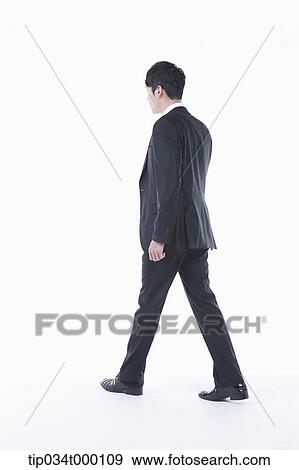 Stock Photo - A walking man . Fotosearch