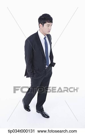 A walking man with his hands in the pocket View Large Photo Image Stock Image - A walking man with his hands in the pocket. Fotosearch