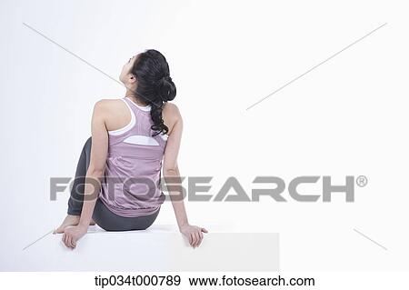 A woman stretching her body View Large Photo Image Stock Photo - A woman stretching her body. Fotosearch