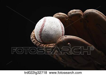 A worn out baseball in a glove View Large Photo Image Stock Photo - A worn out baseball in a glove. Fotosearch