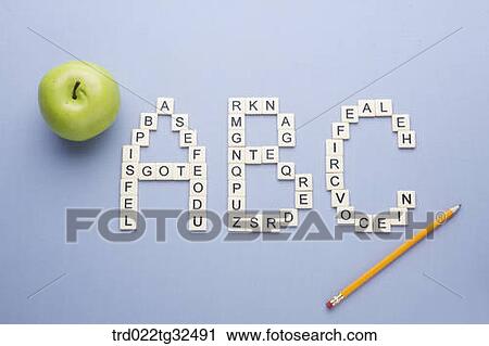 Stock Image - Alphabet ABC blocks with an apple and pencil . Fotosearch