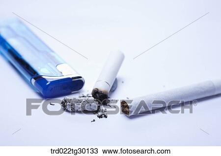 Arranged cigarettes with other scattered cigarettes View Large Photo Image Stock Image - Arranged cigarettes with other scattered cigarettes. Fotosearch