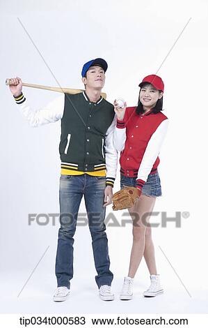 Stock Image - Baseball supporters with baseball equipment. Fotosearch