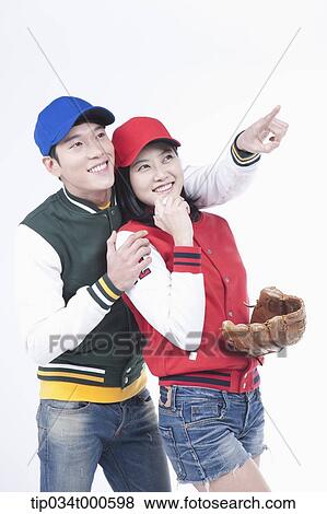 Stock Photo - Baseball supporters with baseball equipment. Fotosearch