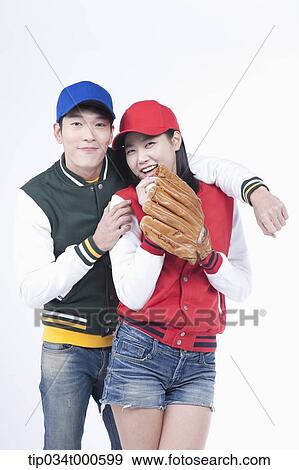 Stock Photo - Baseball supporters with baseball equipment. Fotosearch