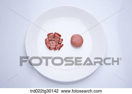 Bitten cookie and another normal cookie View Large Photo Image Stock Image - Bitten cookie and another normal cookie. Fotosearch