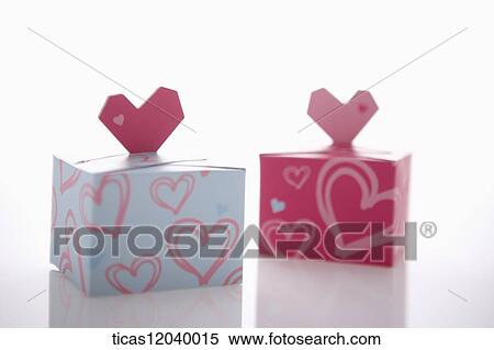 Stock Photography - Blue and pink heart gift box. Fotosearch