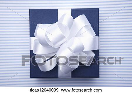 Blue gift box with white ribbon View Large Photo Image Stock Photo - Blue gift box with white ribbon . Fotosearch