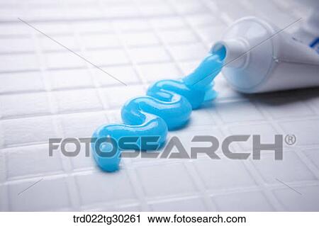 Stock Image - Blue tooth paste from tube. Fotosearch